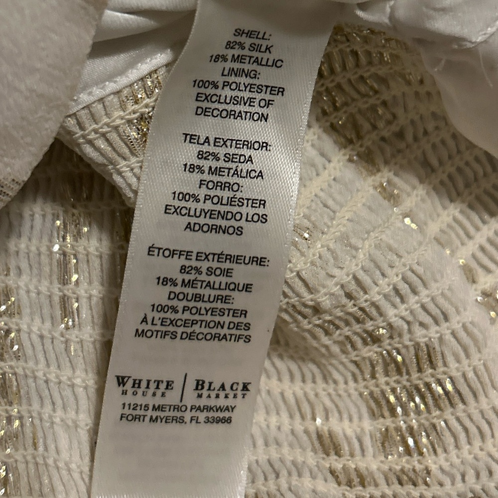 Absolutely beautiful top Size 10.  White House Black Market